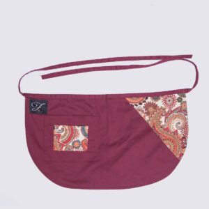 Short red apron with paisley
